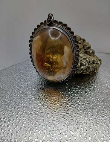AMBER LOCKET
