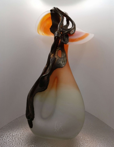 black, white and orange vase
