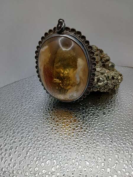 AMBER LOCKET