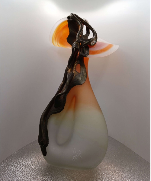black, white and orange vase